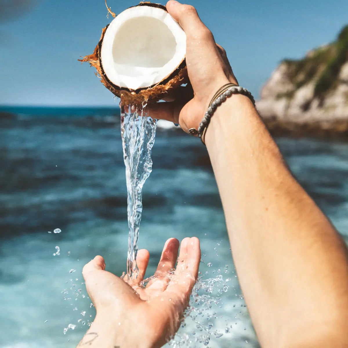 Fresh Coconut Water Pouring – Tropical Imagery Representing Coconut Incense Fragrance
