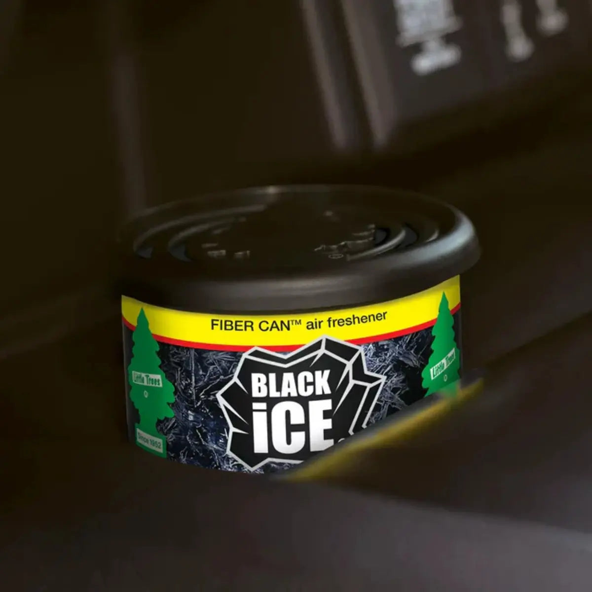 Little Trees Black Ice Fiber Can placed inside a vehicle air vent