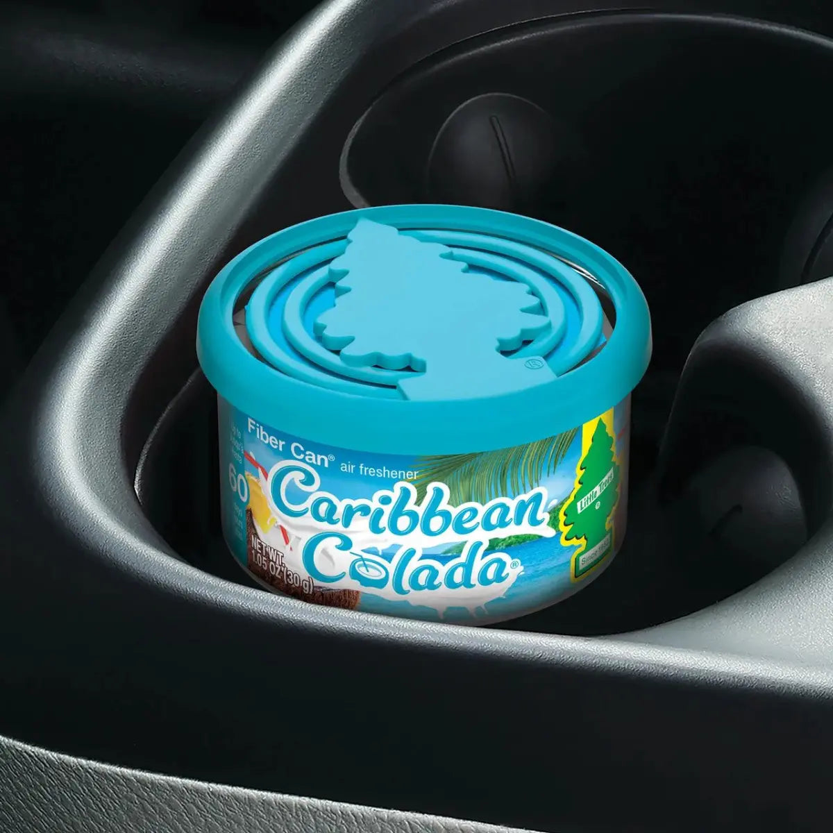 Little Trees Caribbean Colada Fiber Can placed in a car cup holder