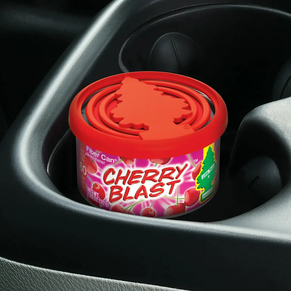 Little Trees Cherry Blast Fiber Can placed inside a car cup holder for use