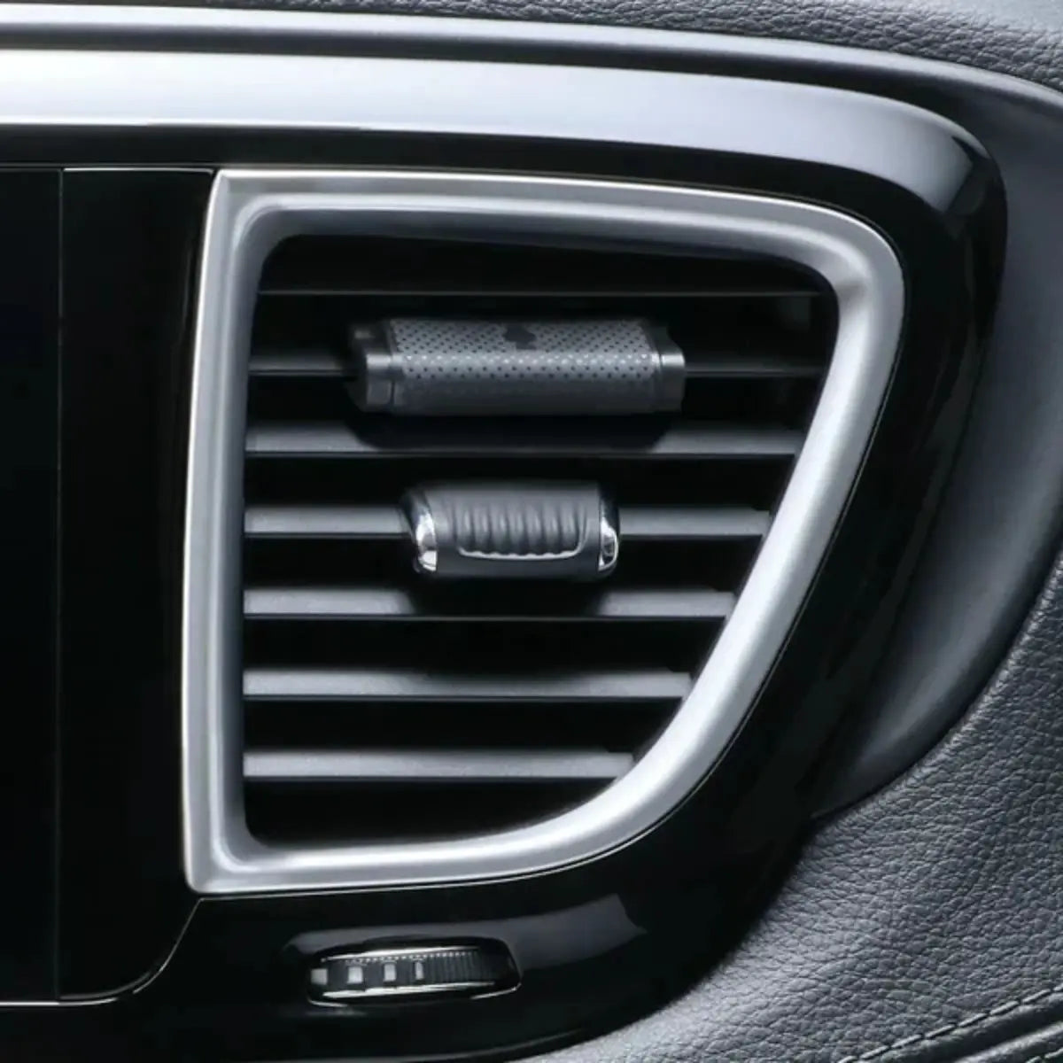 Little Trees Strawberry Vent Wrap installed on a vehicle air vent, designed to release a sweet strawberry fragrance discreetly.